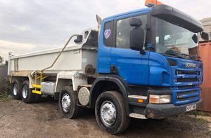 image of tipper lorry with blue cab